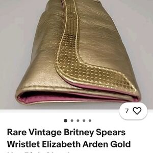 Elegant Gold Wristlet with Pink Interior